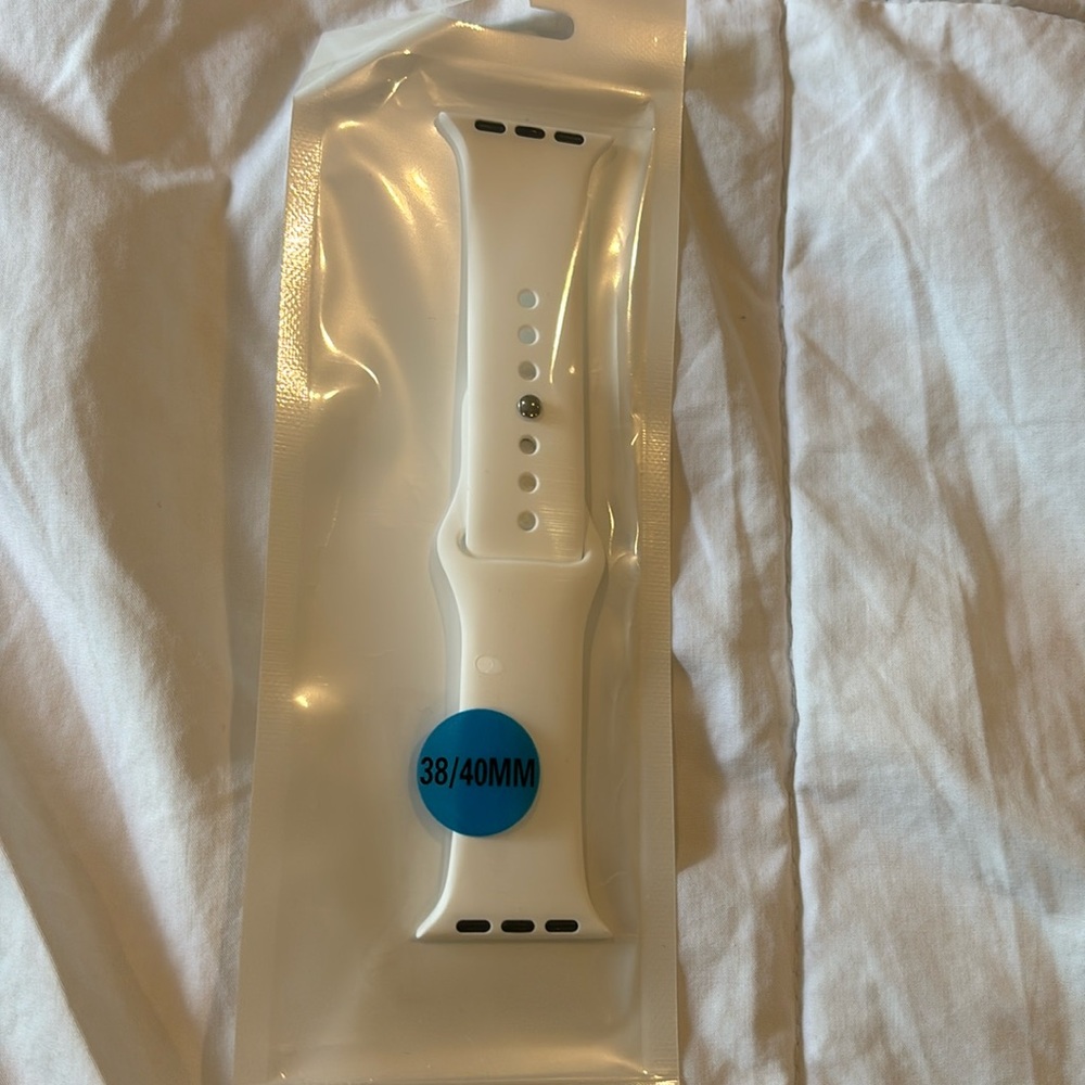 4 Apple Watch Bands different colors. 38/40mm. White, black, gry blue, and taupe